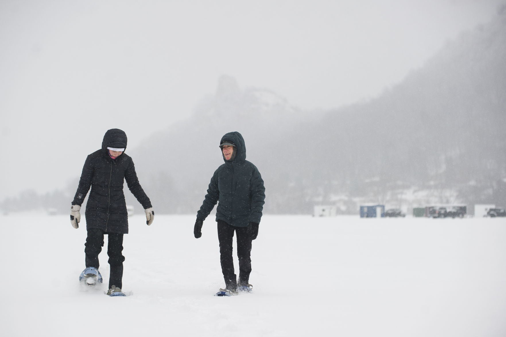 Snowshoeing across the lake
